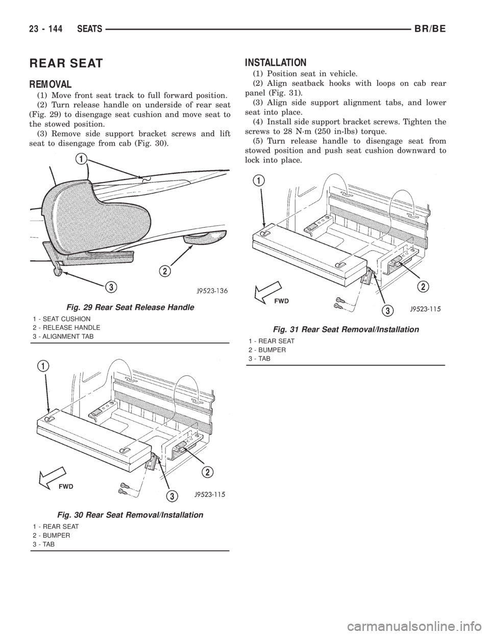 DODGE RAM 2001  Service Repair Manual REAR SEAT
REMOVAL
(1) Move front seat track to full forward position.
(2) Turn release handle on underside of rear seat
(Fig. 29) to disengage seat cushion and move seat to
the stowed position.
(3) Re
