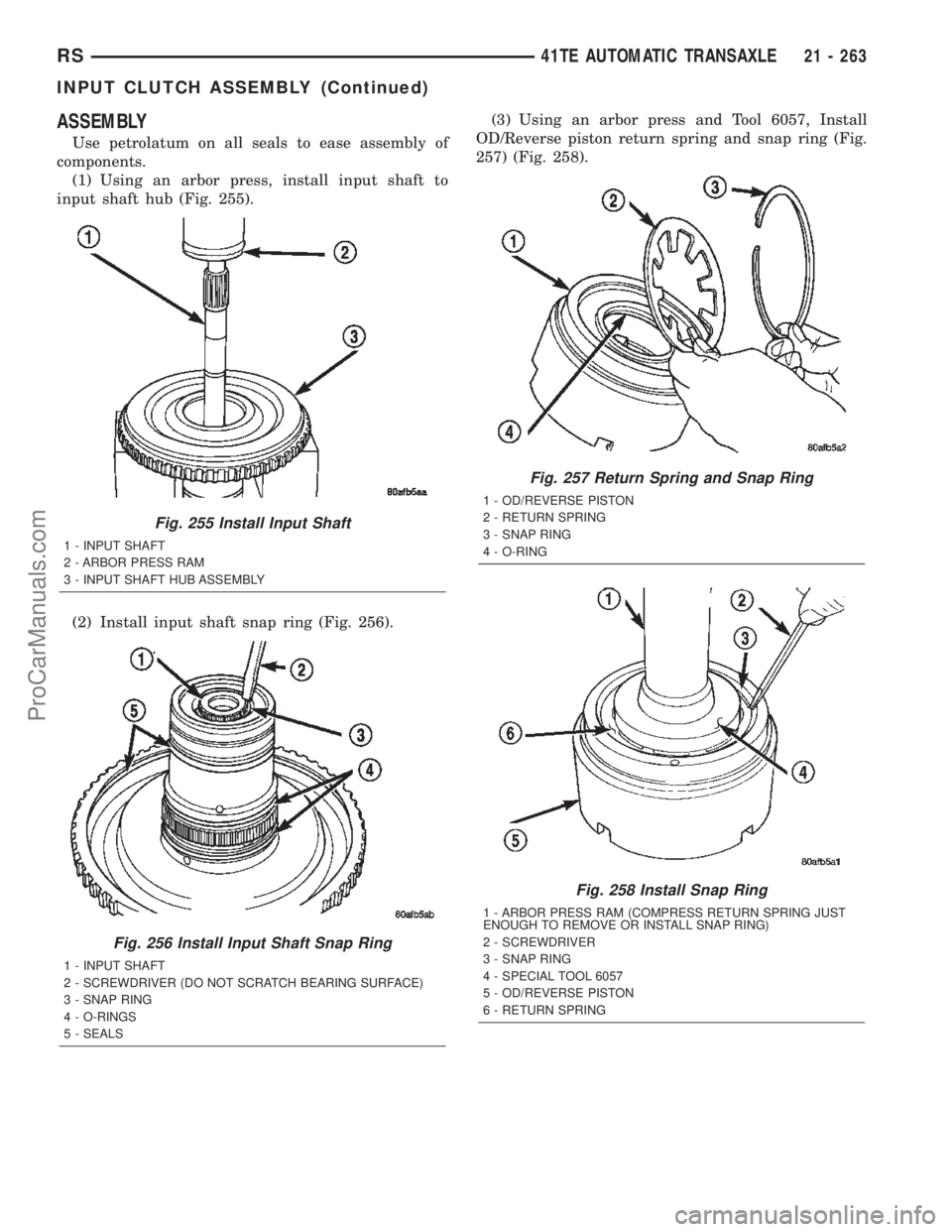 DODGE TOWN AND COUNTRY 2002  Service Manual ASSEMBLY
Use petrolatum on all seals to ease assembly of
components.
(1) Using an arbor press, install input shaft to
input shaft hub (Fig. 255).
(2) Install input shaft snap ring (Fig. 256).(3) Using