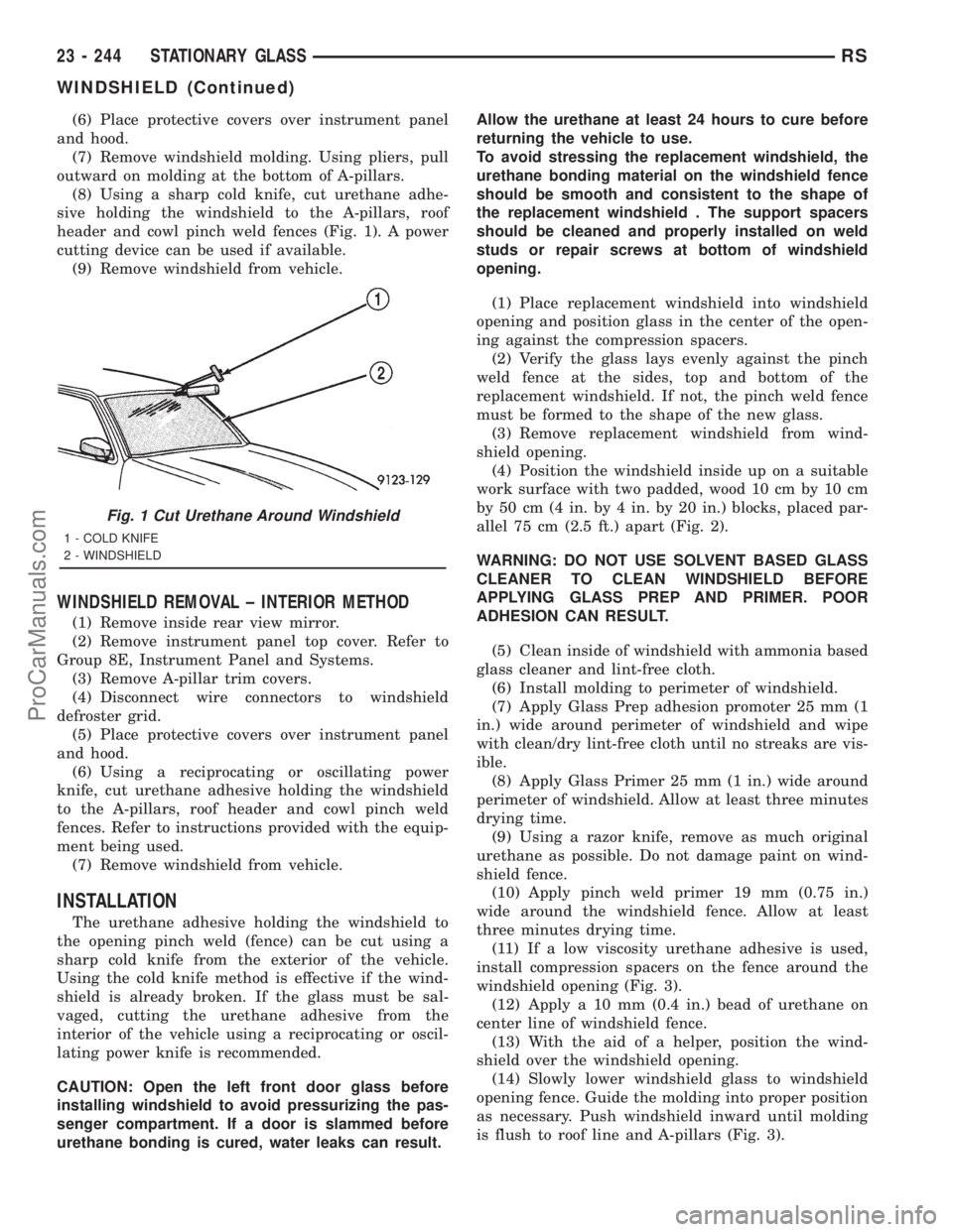 DODGE TOWN AND COUNTRY 2001  Service Manual (6) Place protective covers over instrument panel
and hood.
(7) Remove windshield molding. Using pliers, pull
outward on molding at the bottom of A-pillars.
(8) Using a sharp cold knife, cut urethane 
