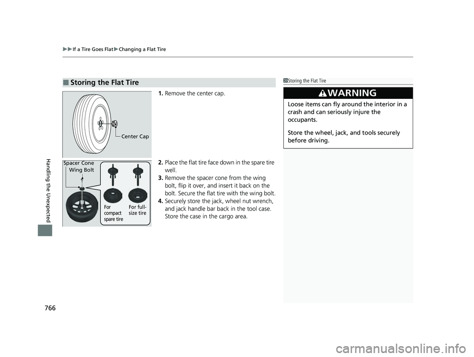 HONDA CIVIC 2023  Owners Manual uuIf a Tire Goes Flat uChanging a Flat Tire
766
Handling the Unexpected
1. Remove the center cap.
2. Place the flat tire face down in the spare tire 
well.
3. Remove the spacer  cone from the wing 
bo
