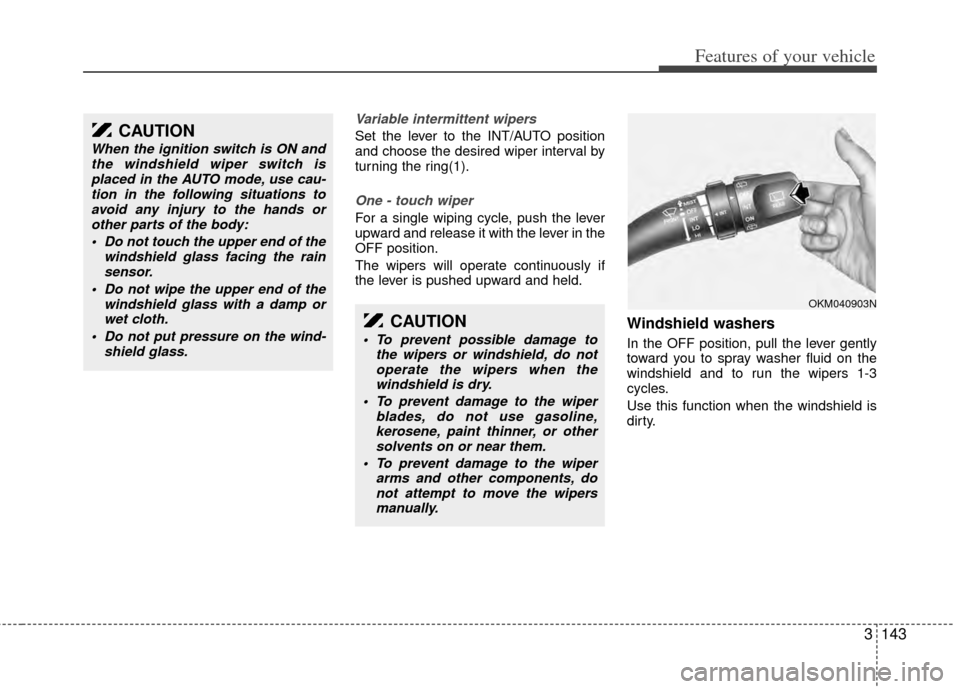 KIA Sedona 2014 3.G Owners Manual 3143
Features of your vehicle
Variable intermittent wipers
Set the lever to the INT/AUTO position
and choose the desired wiper interval by
turning the ring(1).
One - touch wiper  
For a single wiping 