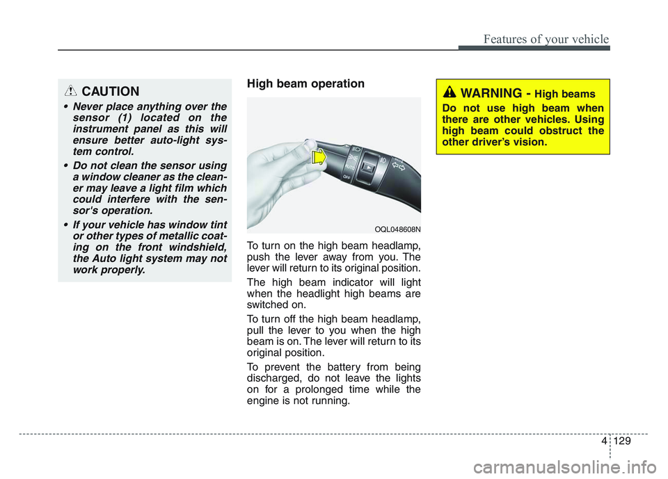 KIA SPORTAGE 2021  Owners Manual 4 129
Features of your vehicle
High beam operation
To turn on the high beam headlamp,
push the lever away from you. The
lever will return to its original position.
The high beam indicator will light
w
