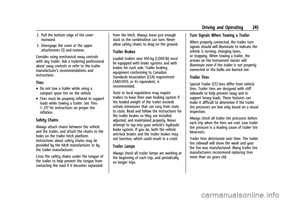CHEVROLET EQUINOX 2023  Owners Manual Chevrolet Equinox Owner Manual (GMNA-Localizing-U.S./Canada-
16540728) - 2023 - crc - 6/16/22
Driving and Operating 245
2. Pull the bottom edge of the coverrearward.
3. Disengage the cover at the uppe