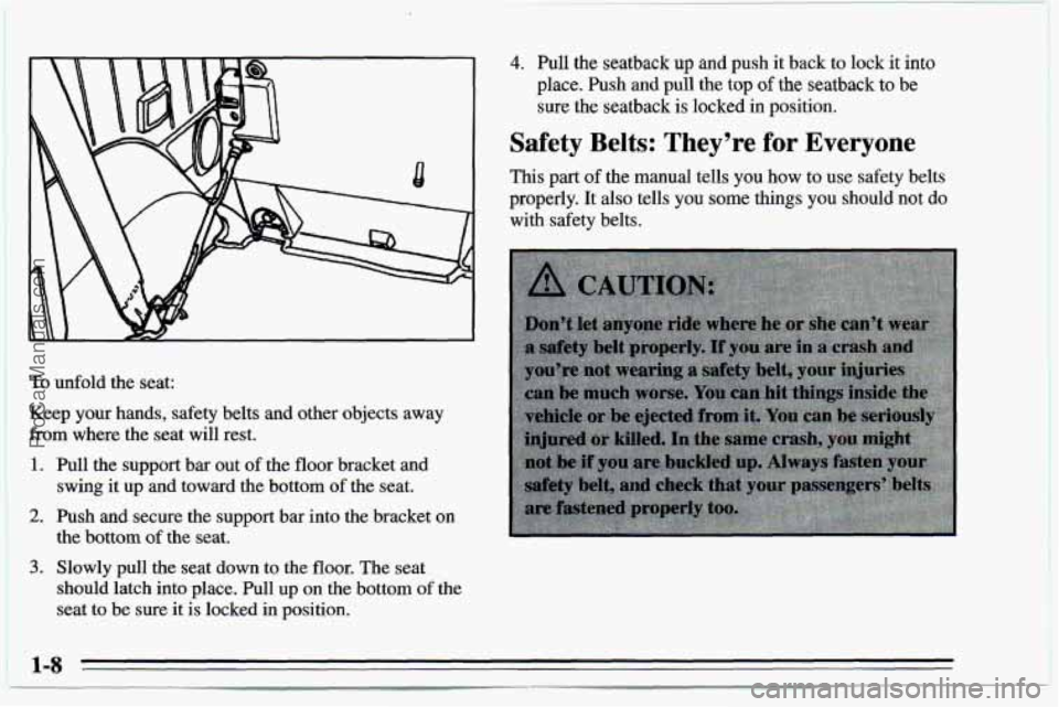 CHEVROLET TRACKER 1995  Owners Manual To unfold the seat: 
Keep  your hands,  safety belts and  other  objects away 
from  where  the seat will  rest. 
1. Pull  the support bar out of the floor bracket  and 
swing  it  up and toward  the 