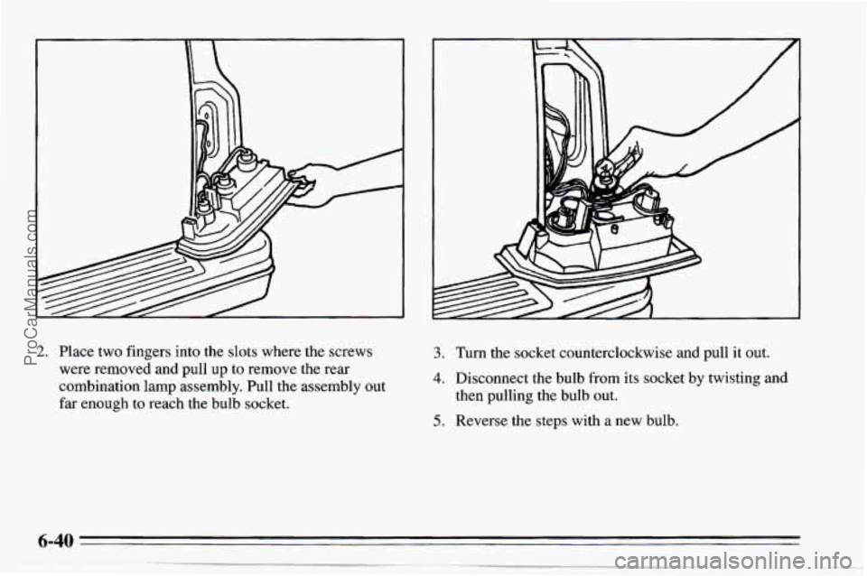 CHEVROLET TRACKER 1995  Owners Manual A 
2. Place two fingers into the slots where the screws 
were removed and pull up to remove the rear 
combination  lamp assembly.  Pull the assembly out 
far enough  to reach the bulb socket. 3. Turn 