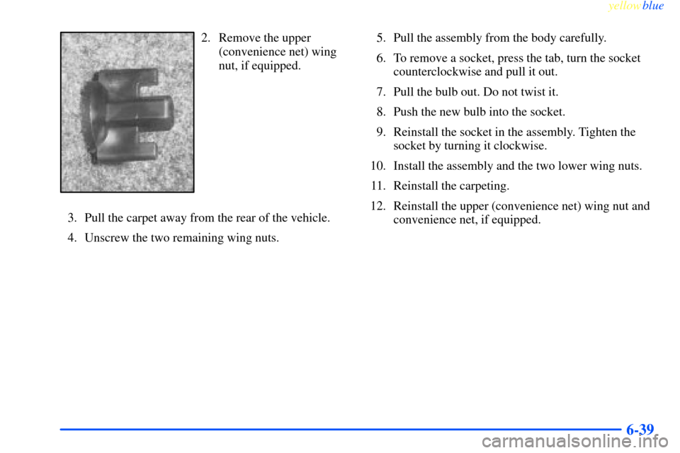 CHEVROLET IMPALA 2000 8.G Owners Manual yellowblue     
6-39
2. Remove the upper
(convenience net) wing
nut, if equipped.
3. Pull the carpet away from the rear of the vehicle.
4. Unscrew the two remaining wing nuts.5. Pull the assembly from