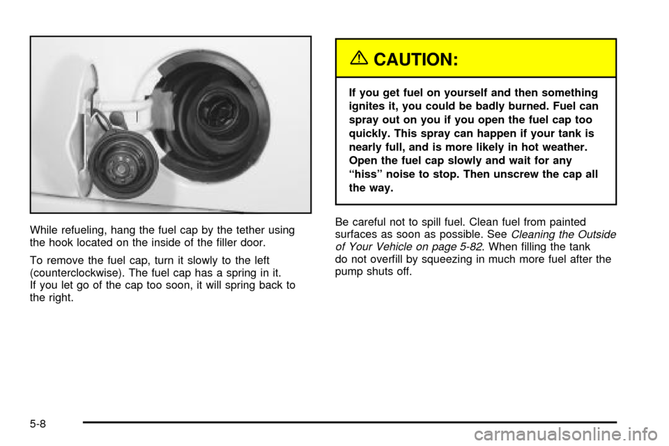CHEVROLET TRAIL BLAZER 2003 1.G Owners Manual While refueling, hang the fuel cap by the tether using
the hook located on the inside of the ®ller door.
To remove the fuel cap, turn it slowly to the left
(counterclockwise). The fuel cap has a spri