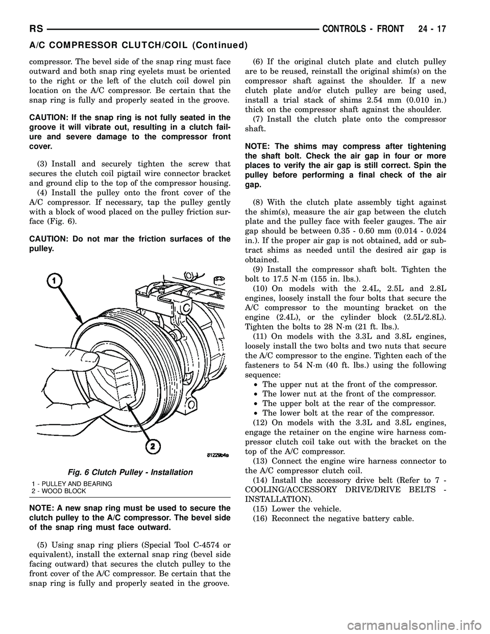 CHRYSLER CARAVAN 2005  Service Manual compressor. The bevel side of the snap ring must face
outward and both snap ring eyelets must be oriented
to the right or the left of the clutch coil dowel pin
location on the A/C compressor. Be certa