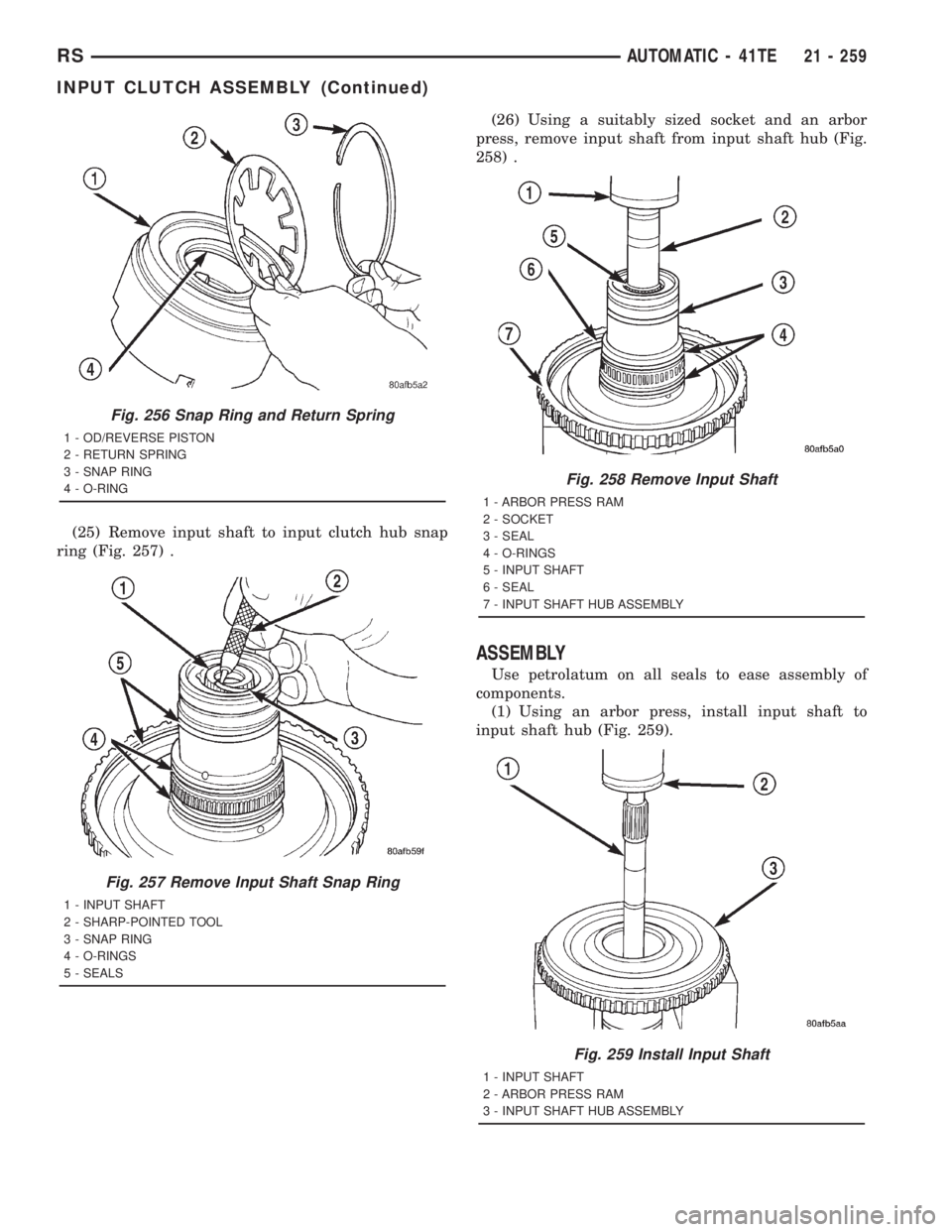 CHRYSLER VOYAGER 2001  Service Manual (25) Remove input shaft to input clutch hub snap
ring (Fig. 257) .(26) Using a suitably sized socket and an arbor
press, remove input shaft from input shaft hub (Fig.
258) .
ASSEMBLY
Use petrolatum on