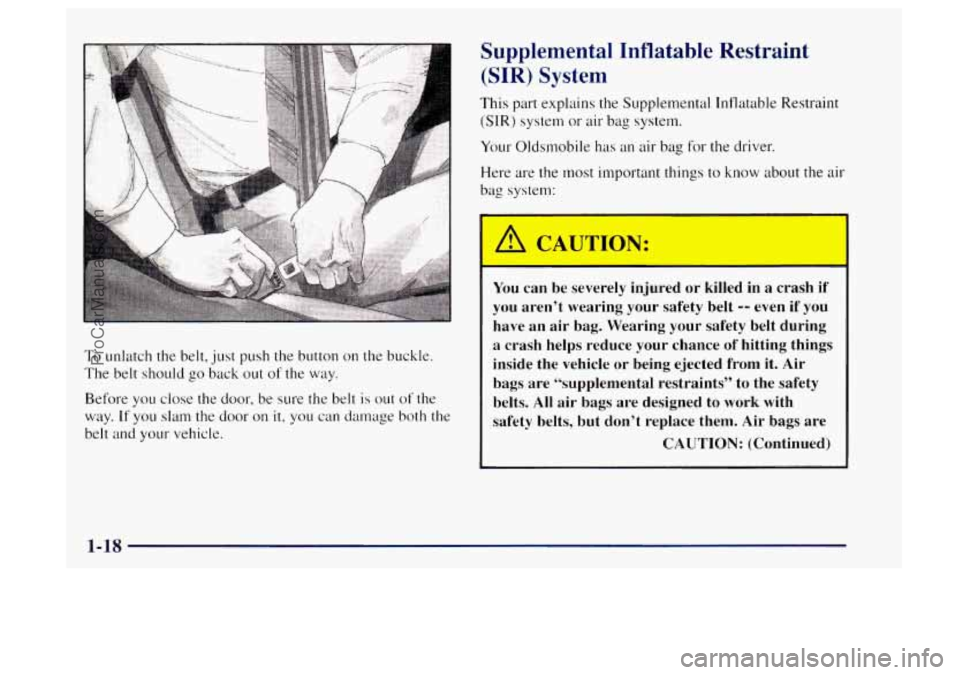 OLDSMOBILE BRAVADA 1997  Owners Manual To unlatch the belt,  just push  the button on the buckle. 
The  belt should  go back 
out of the  way. 
Before  you close  the door,  be sure  the  belt 
is out of the 
way. 
If you slam the  door on