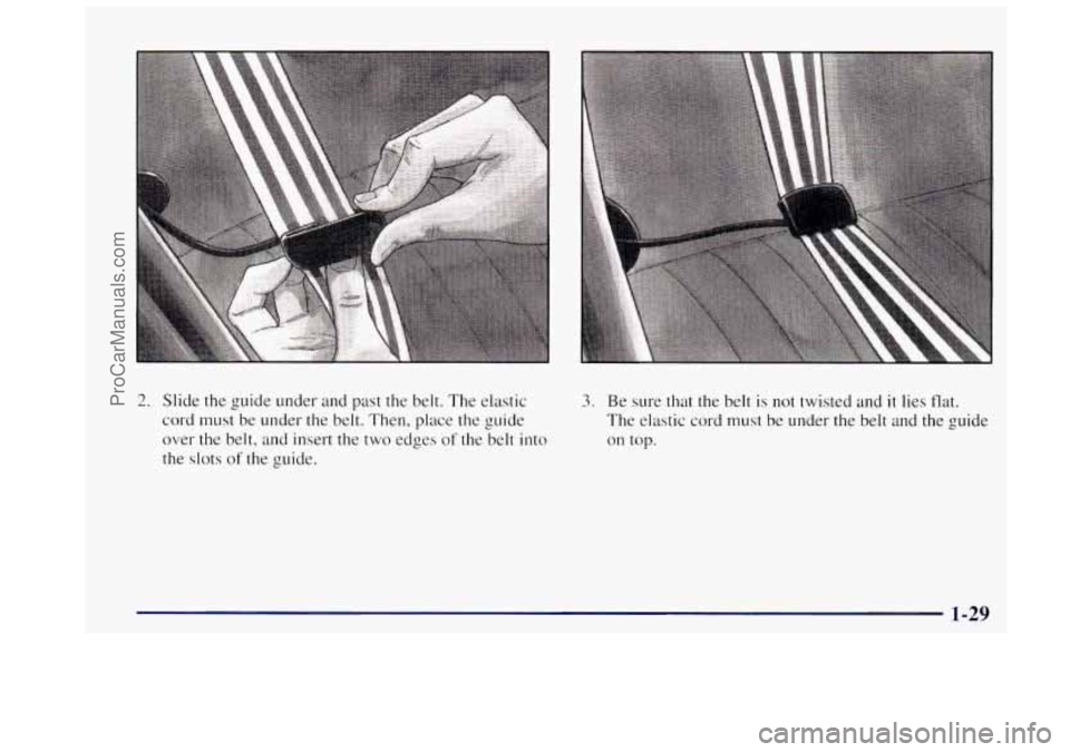 OLDSMOBILE BRAVADA 1997  Owners Manual 2. Slide the guide under  and past  the belt. The elastic 
cord must  be under  the belt.  Then,  place the guide 
over  the belt,  and insert  the two  edges 
of the  belt  into 
the slots 
of the  g