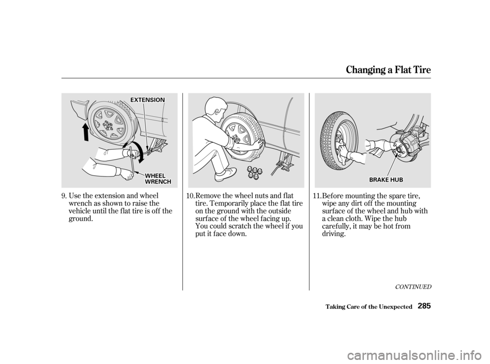 Acura RL 2002  3.5 Owners Manual CONT INUED
Use the extension and wheel
wrench as shown to raise the
vehicle until the f lat tire is of f the
ground.Remove the wheel nuts and f lat
tire. Temporarily place the f lat tire
on the ground