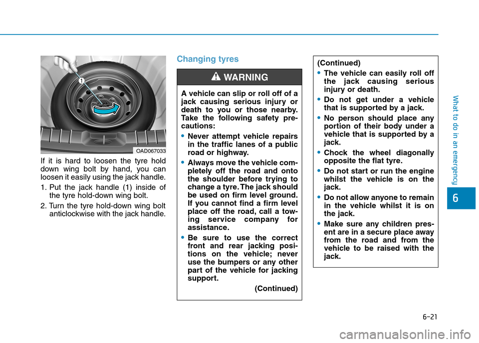 Hyundai Ioniq Hybrid 2020  Owners Manual - RHD (UK, Australia) 6-21
What to do in an emergency
6
If it is hard to loosen the tyre hold
down wing bolt by hand, you can
loosen it easily using the jack handle.
1. Put the jack handle (1) inside of
the tyre hold-down 