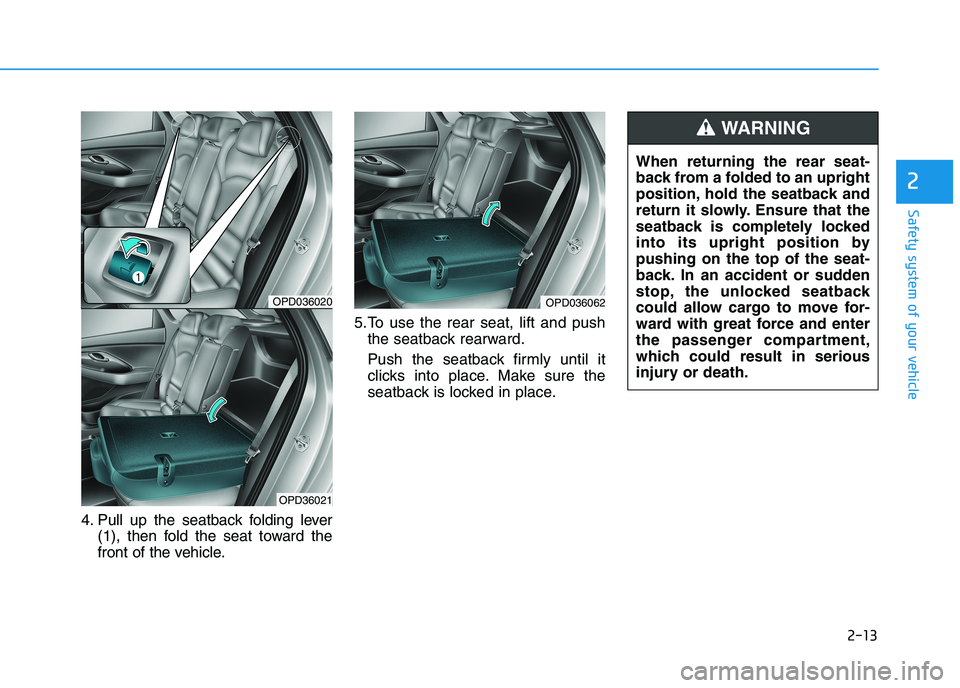 HYUNDAI I30 2023  Owners Manual 2-13
Safety system of your vehicle
4. Pull up the seatback folding lever
(1), then fold the seat toward the
front of the vehicle.5.To use the rear seat, lift and push
the seatback rearward.
Push the s