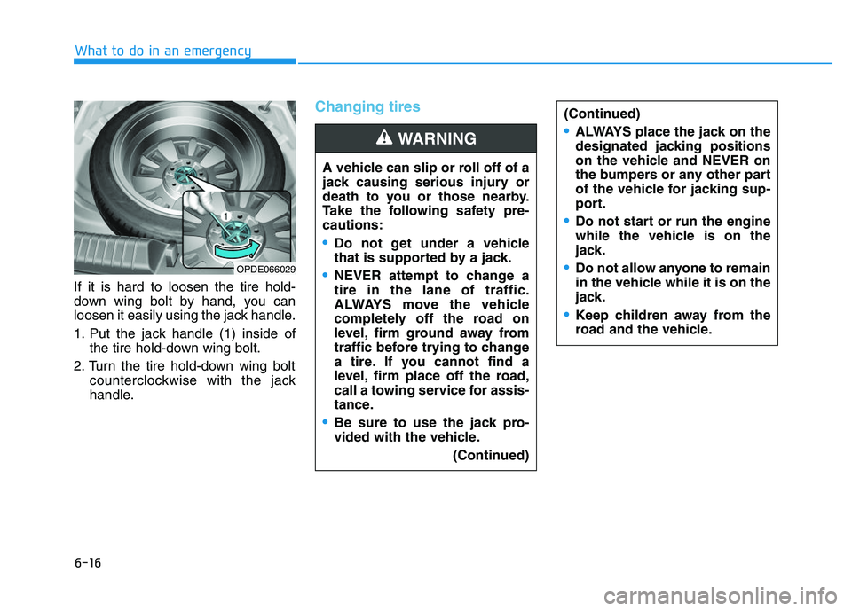 HYUNDAI I30 2022  Owners Manual 6-16
What to do in an emergency
If it is hard to loosen the tire hold-
down wing bolt by hand, you can
loosen it easily using the jack handle.
1. Put the jack handle (1) inside of the tire hold-down w