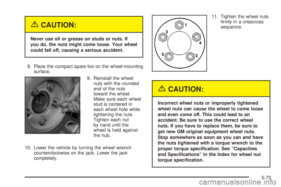 BUICK LESABRE 2003 Owners Manual {CAUTION:
Never use oil or grease on studs or nuts. If
you do, the nuts might come loose. Your wheel
could fall off, causing a serious accident.
8. Place the compact spare tire on the wheel-mounting
s BUICK LESABRE 2003 Owners Manual {CAUTION:
Never use oil or grease on studs or nuts. If
you do, the nuts might come loose. Your wheel
could fall off, causing a serious accident.
8. Place the compact spare tire on the wheel-mounting
s