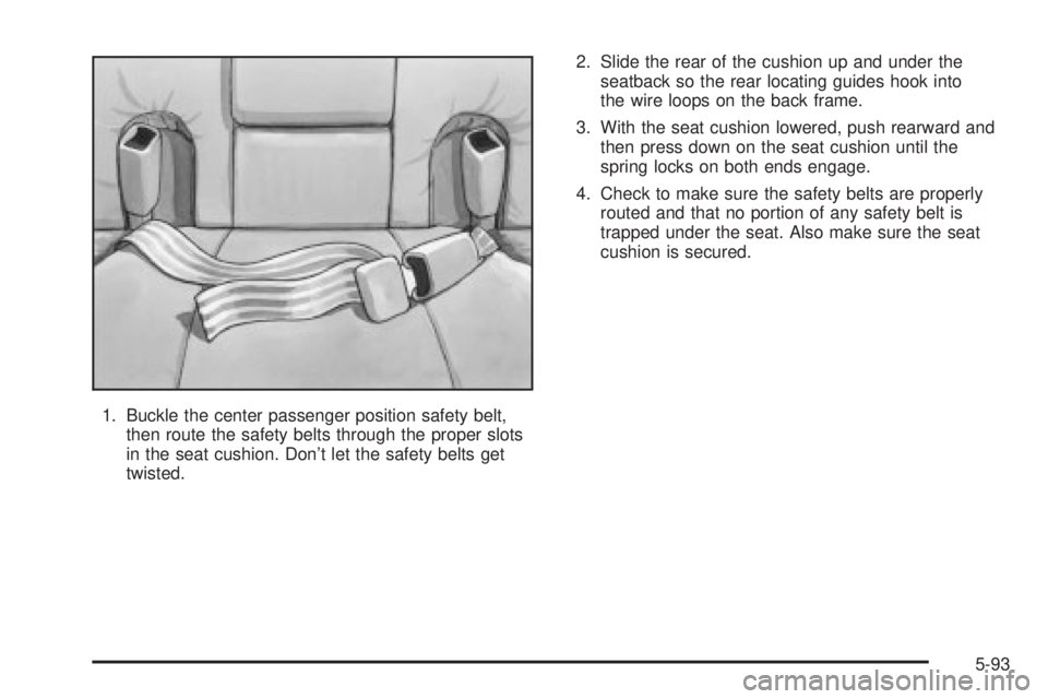 BUICK PARK AVENUE 2003  Owners Manual 1. Buckle the center passenger position safety belt,
then route the safety belts through the proper slots
in the seat cushion. Dont let the safety belts get
twisted.2. Slide the rear of the cushion u