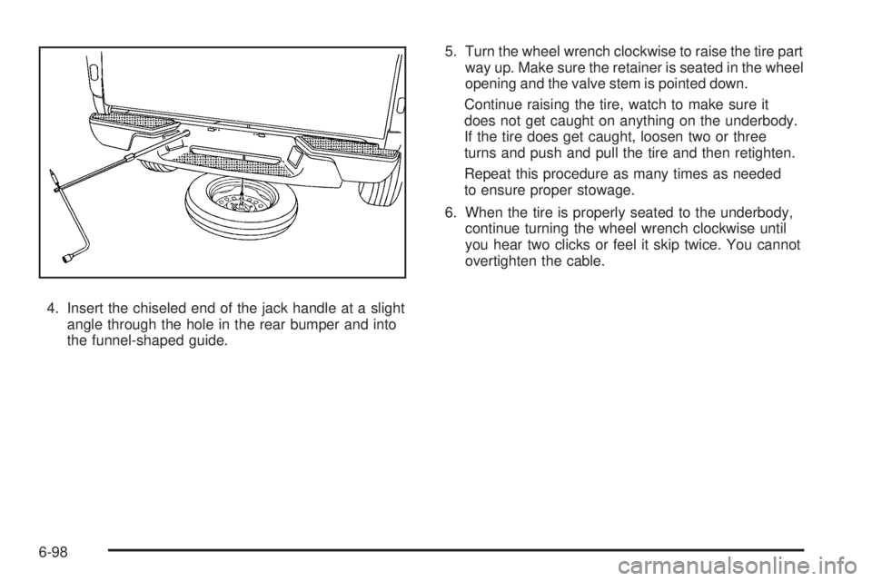 GMC CANYON 2010  Owners Manual 4. Insert the chiseled end of the jack handle at a slight
angle through the hole in the rear bumper and into
the funnel-shaped guide.5. Turn the wheel wrench clockwise to raise the tire part
way up. M