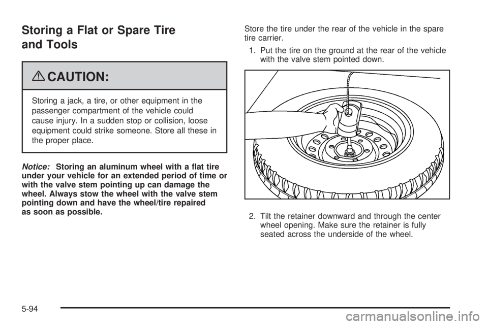 GMC CANYON 2009  Owners Manual Storing a Flat or Spare Tire
and Tools
{CAUTION:
Storing a jack, a tire, or other equipment in the
passenger compartment of the vehicle could
cause injury. In a sudden stop or collision, loose
equipme