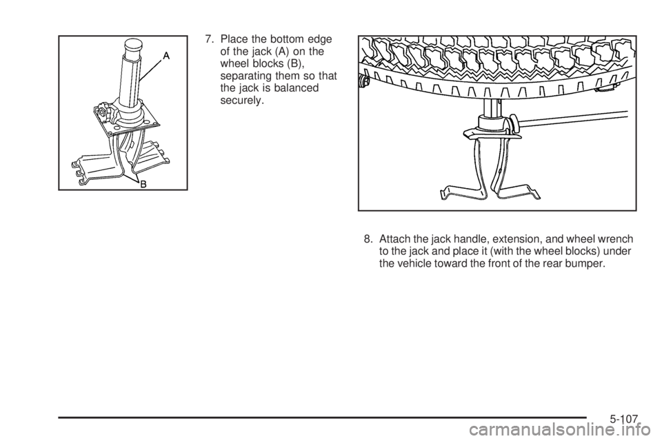 GMC SIERRA 2009  Owners Manual 7. Place the bottom edge
of the jack (A) on the
wheel blocks (B),
separating them so that
the jack is balanced
securely.
8. Attach the jack handle, extension, and wheel wrench
to the jack and place it