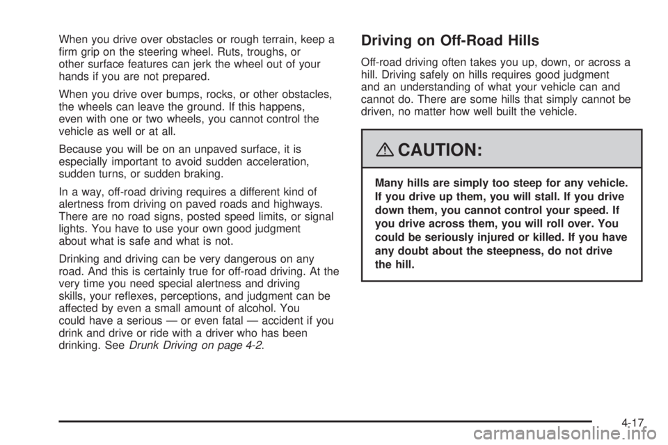 GMC SIERRA 2008  Owners Manual When you drive over obstacles or rough terrain, keep a
�rm grip on the steering wheel. Ruts, troughs, or
other surface features can jerk the wheel out of your
hands if you are not prepared.
When you d