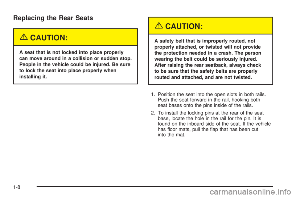 GMC SAVANA 2005  Owners Manual Replacing the Rear Seats
{CAUTION:
A seat that is not locked into place properly
can move around in a collision or sudden stop.
People in the vehicle could be injured. Be sure
to lock the seat into pl