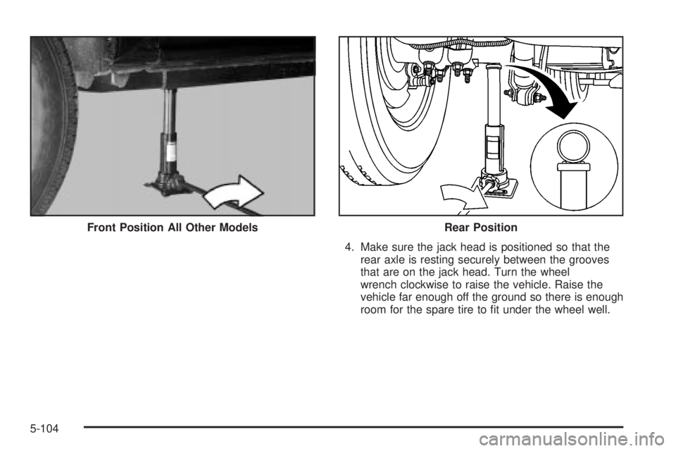 GMC SIERRA 2004  Owners Manual 4. Make sure the jack head is positioned so that the
rear axle is resting securely between the grooves
that are on the jack head. Turn the wheel
wrench clockwise to raise the vehicle. Raise the
vehicl