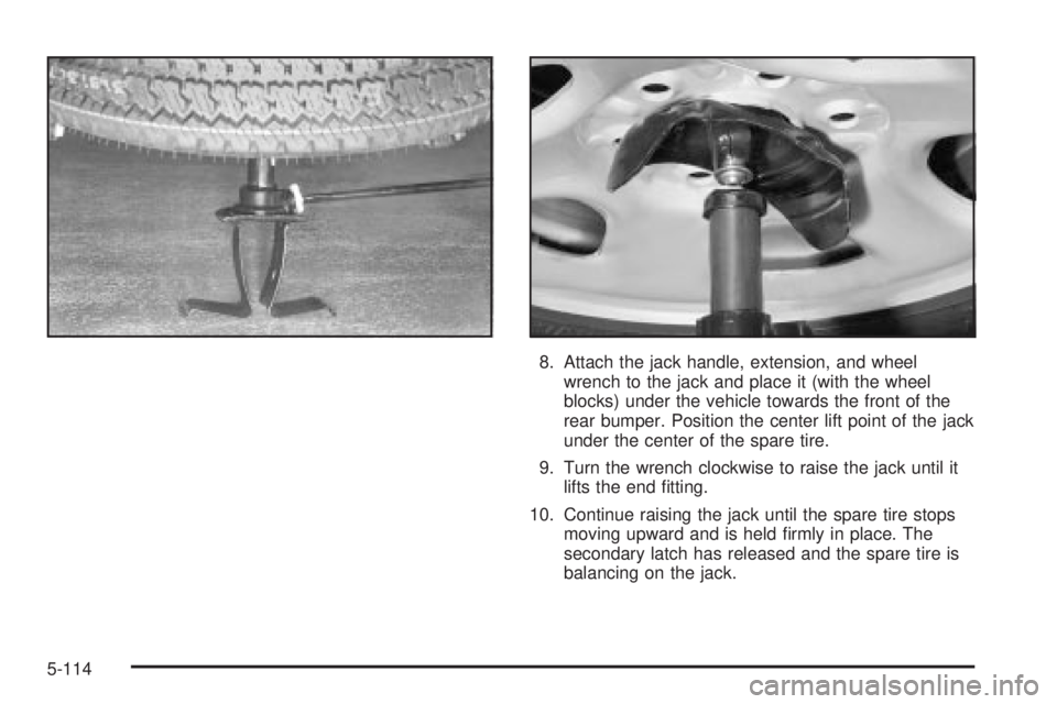 GMC SIERRA 2004  Owners Manual 8. Attach the jack handle, extension, and wheel
wrench to the jack and place it (with the wheel
blocks) under the vehicle towards the front of the
rear bumper. Position the center lift point of the ja