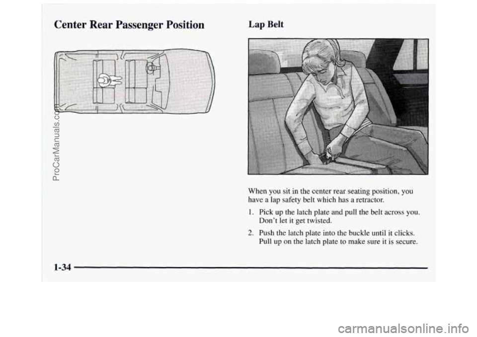GMC ENVOY 1998  Owners Manual Center Rear Passenger Position Lap Belt 
When you sit in the  center  rear  seating  position,  you 
have  a  lap  safety  belt  which has 
a retractor. 
1. Pick up  the  latch  plate  and  pull the b
