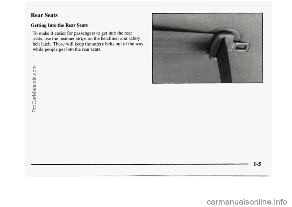 GMC SAVANA 1998  Owners Manual Rear  Seats 
Getting  Into  the  Rear  Seats 
To make it easier for passengers  to get  into the rear 
seats,  use the  fastener  strips on  the  headliner 
and safety 
belt  latch.  These  will keep 
