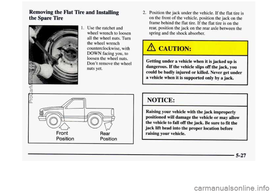 GMC SIERRA 1997  Owners Manual Removing  the  Flat  Tire  and  Installing 
the 
Spare Tire 
1 1. Use  the ratchet and 
wheel  wrench  to  loosen 
all the  wheel  nuts.  Turn 
the  wheel  wrench 
counterclockwise,  with 
DOWN facing