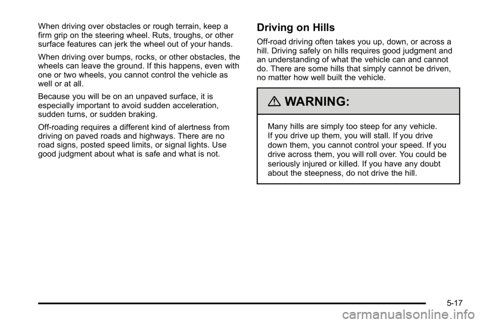 GMC SIERRA DENALI 2010  Owners Manual When driving over obstacles or rough terrain, keep a
firm grip on the steering wheel. Ruts, troughs, or other
surface features can jerk the wheel out of your hands.
When driving over bumps, rocks, or 