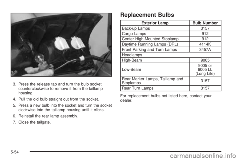 GMC SIERRA DENALI 2005  Owners Manual 3. Press the release tab and turn the bulb socket
counterclockwise to remove it from the taillamp
housing.
4. Pull the old bulb straight out from the socket.
5. Press a new bulb into the socket and tu