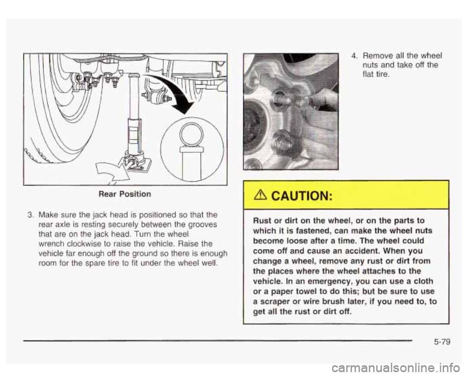 GMC SIERRA DENALI 2003  Owners Manual Rear Position 
3. Make  sure  the  jack head  is positioned so that  the 
rear  axle 
is resting securely  between  the  grooves 
that  are on  the  jack head.  Turn  the  wheel 
wrench  clockwise to 