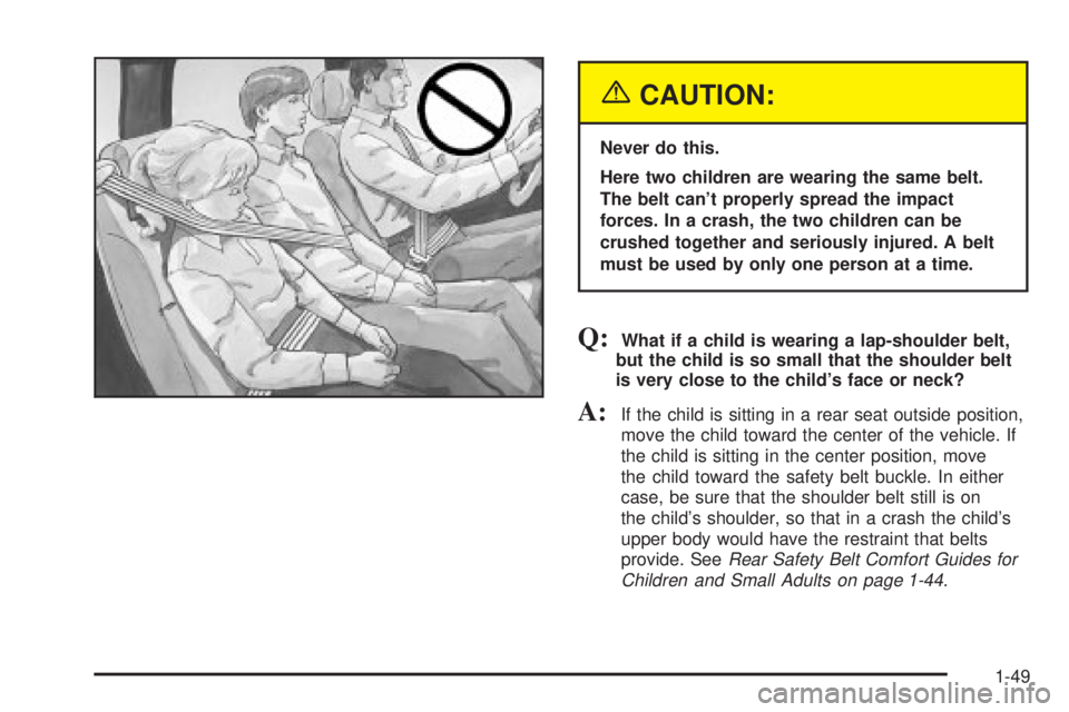 GMC YUKON DENALI 2004  Owners Manual {CAUTION:
Never do this.
Here two children are wearing the same belt.
The belt cant properly spread the impact
forces. In a crash, the two children can be
crushed together and seriously injured. A be