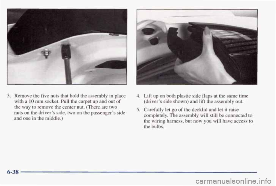 PONTIAC BONNEVILLE 1998  Owners Manual 3. Remove  the five nuts  that  hold  the  assembly in place 
with  a 
10 mm socket.  Pull  the  carpet up and  out of 
the  way  to  remove  the  center  nut.  (There  are  two 
nuts 
on the drivers