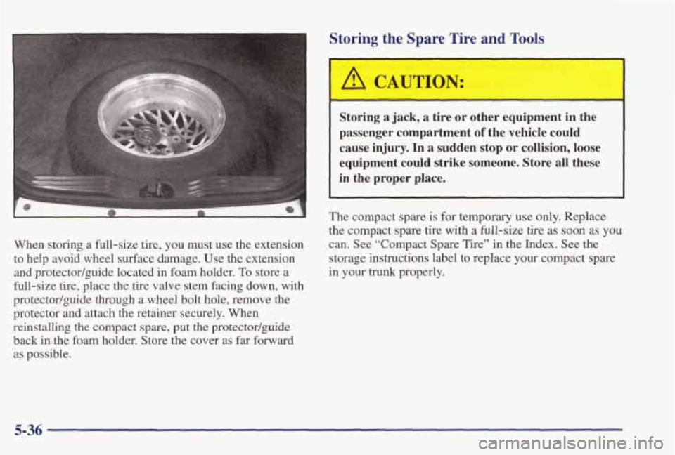 PONTIAC GRAND PRIX 1998  Owners Manual When storing a full-size  tire,  you  must  use  the  extension 
to  help  avoid  wheel  surface  damage.  Use 
the extension 
and protectodguide  located in foam  holder. To store  a 
full-size  tire