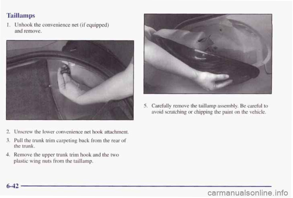 PONTIAC GRAND PRIX 1998  Owners Manual Taillamps 
1. Unhook the convenience  net (if equipped) 
and remove. 
2. Unscrew the lower  convenience  net hook attachment. 
3. Pull the  trunk trim carpeting back from  the  rear  of 
4. Remove the